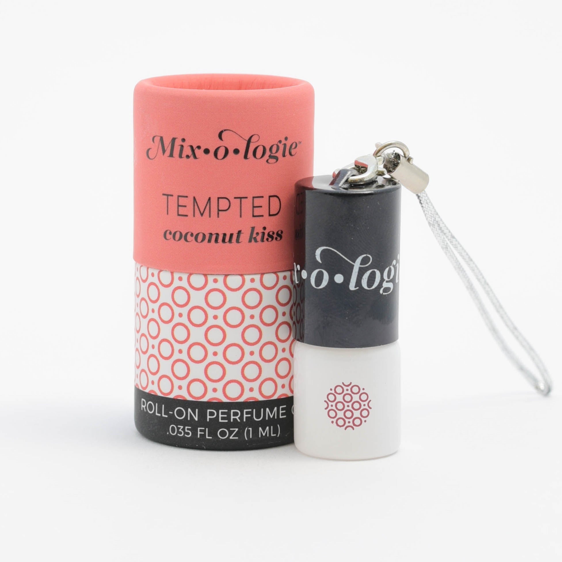 Mixologie's Tempted (coconut kiss) scented mini rollerball in 1 mL bottle with keychain lid. Displayed with cylinder packaging.