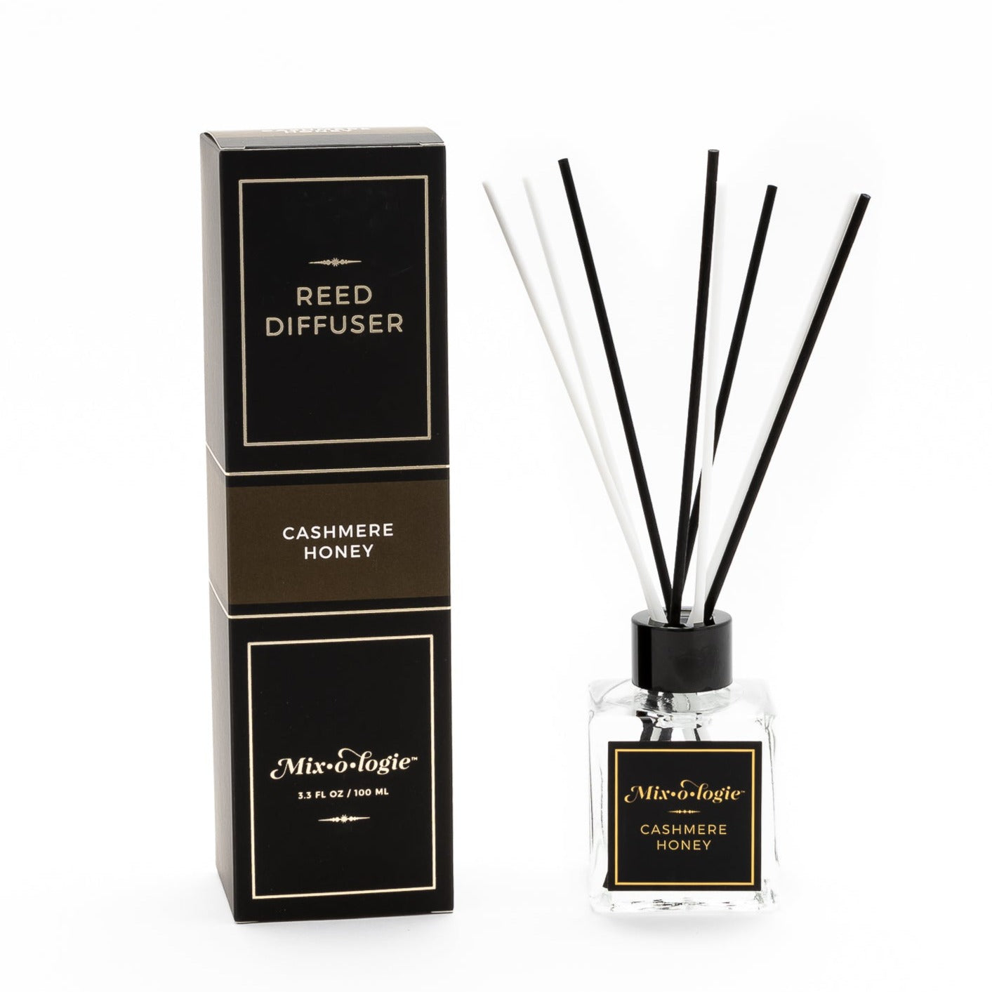 Reed diffuser scented with cashmere honey. 3.3 FL OZ glass bottle with 8 black and white reed diffuser sticks.