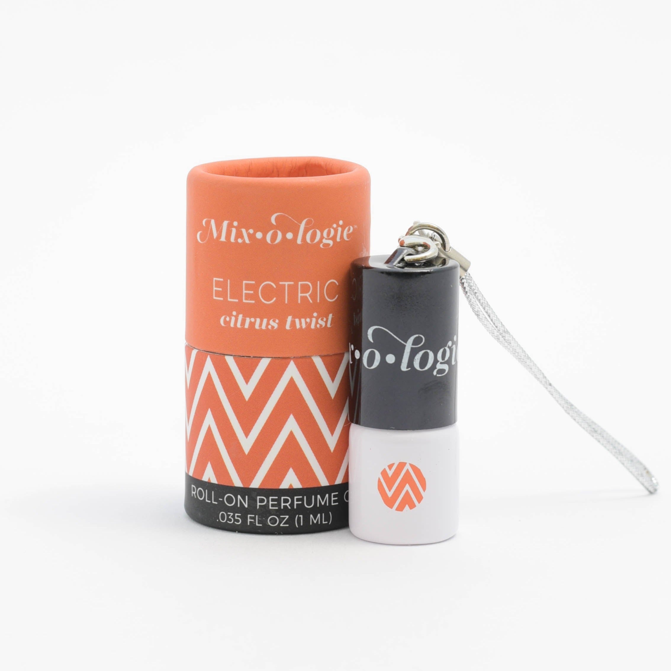 Mini keychain rollerball perfume scented with Mixologie's Electric (citrus twist) scent in 1 mL glass bottle with keychain lid. Displayed next to small cylinder packaging
