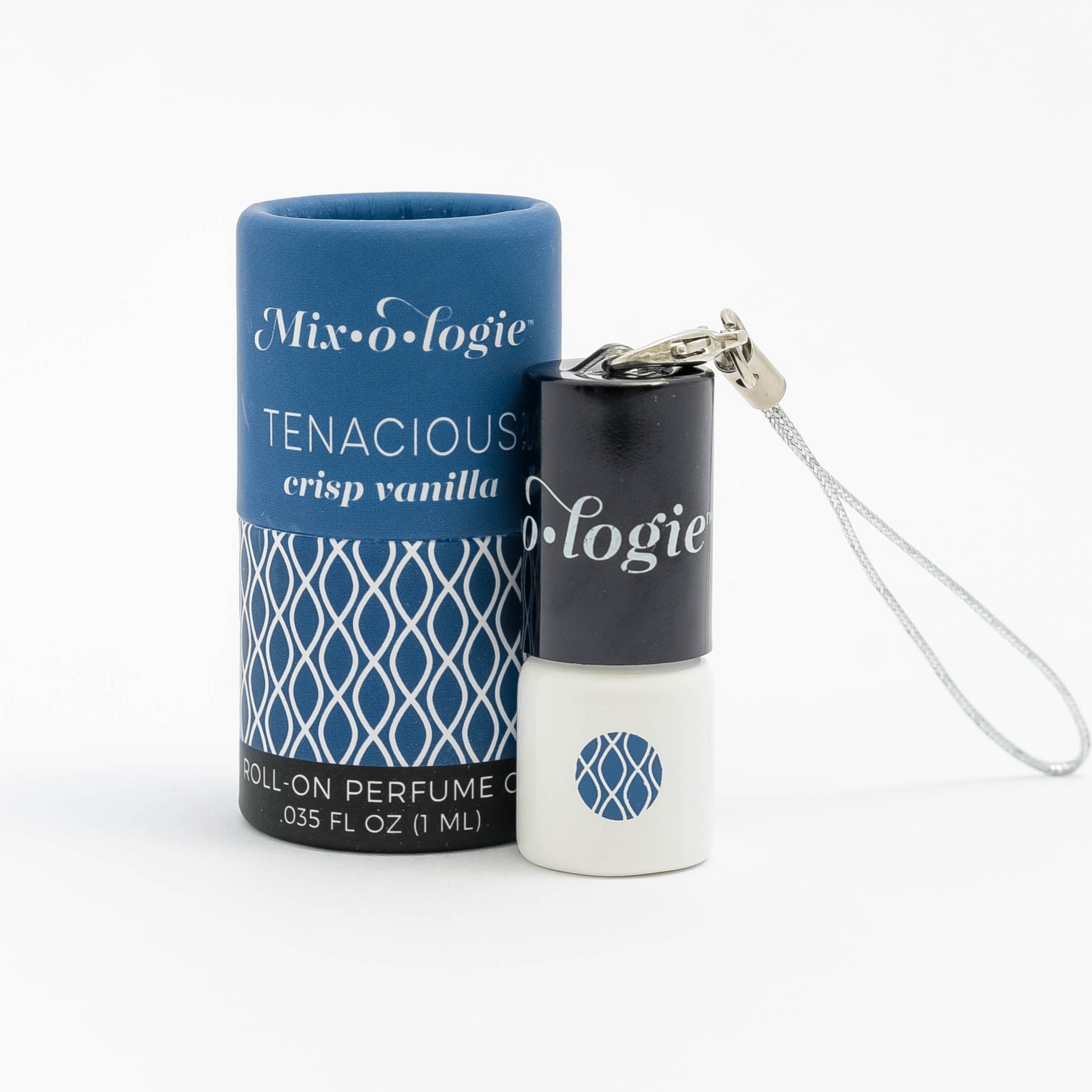 Mixologie's Tenacious (crisp vanilla) scented mini rollerball in 1 mL bottle with keychain lid. Displayed with cylinder packaging.